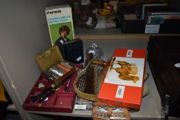 A miscellany of items including boxed vintage handkerchiefs, electric clothes brush, smoking