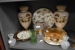 A pair of hand painted glass vase with floral decor and similar glass wares including medical