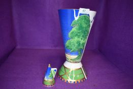A large standing vase and candle snuffer by Royal Worcester in Lazy Days designs from the Art Deco