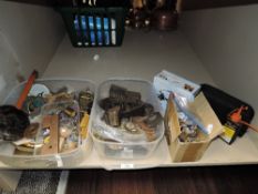 A selection of clock and watch parts and repair kits