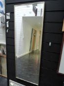 A long dressing mirror having bevel edged glass