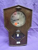 A wood framed wall clock