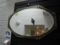 An art deco design mirror having geometric metal frame work