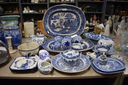A good selection of various blue and white ware ceramics and porcelain including carpet bowls and
