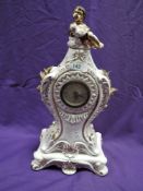 A ceramic mantel clock made in Italy with a German movement