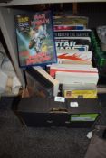 A mixed lot of books and VHS tapes of film and pop culture interest.