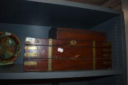 Two antique writers compendiums one portable size and a larger mahogany and brass banded example