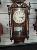 An American style wall having ornate casing with inlayed banding.