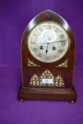 An impressive late Victorian bracket clock in a bishops hat design having a French movement
