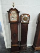 An Enfield Granddaughter clock and an oak bodied granddaughter clock with a quartz movement