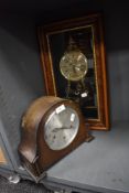 A wall mounted Louis XVI replica clock and similar Smiths mantle clock