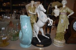 A collection of ceramics including two Dux style figurines.