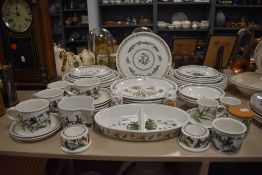 A large collection of Portmeirion including serving dish,plates and cups.