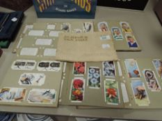 A collection of cigarette cards.