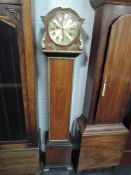 A Granddaughter clock with quartz movement in a 1930's case