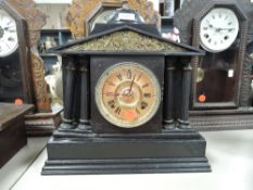 A slate effect wood bodied 8 day mantel clock A/F