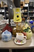 A collection of vintage fruit and veg shaped condiment and similar storage jars.