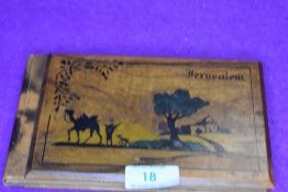 A pilgrims keepsake from Jerusalem and a similar small Hebrew Torah scroll