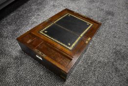 A writers compendium case having mahogany case with brass fitments