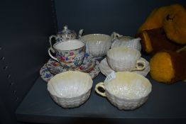 A small selection of Belleek tea wares and similar cottage chintz