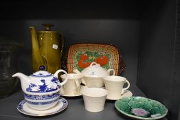 A part art deco tea service and similar ceramics including green glaze coffee pot
