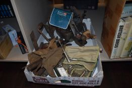 An assortment of vintage tools including woodworking planes and medical equipment including