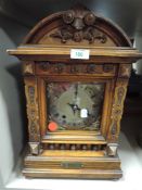 A 19th Century German carved mantel clock