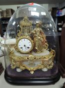 A French Ormilou gilt allabaster mantel clock (damage to dome)