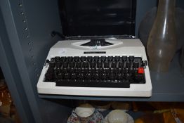 An Imperial 205 typewriter with case