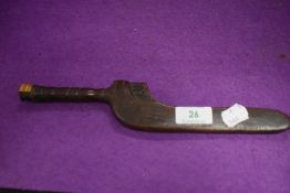 An antique knitting stick or distaff having carved decoration