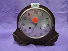 A mid century 8 day mantel clock