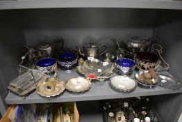 A fine selection of various plated wares including blue glass salts and part tea sets
