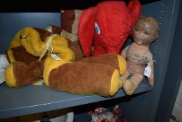 A selection of early 20th century soft toys including doll and red elephant