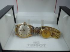 A gent's vintage Tissot wrist watch having a baton numeral dial in gold plated case on a bracelet