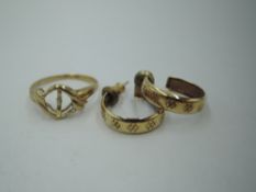 A pair of 9ct gold hoop stud earrings and a yellow metal ring loop stamped 9K (missing stone),