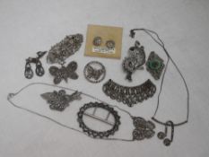 A selection of cut steel and marcasite jewellery including necklaces, brooches, earrings and