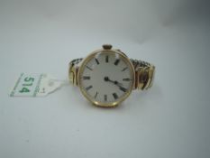 A converted yellow metal top wound pocket watch stamped 14K having Roman numeral dial to damaged