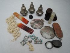 A small selection of misc including a broken orange agate page turner, trio of decorative buckles,