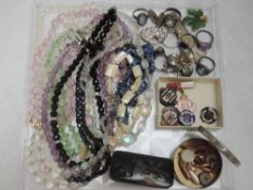 A selection of costume, white metal and HM silver jewellery including rings, strings of beads,