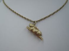A 9ct gold hare charm on a 9ct gold rope chain, approx 18' & 7.1g