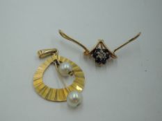 A sapphire and diamond chip cluster pendant in a stylised oversized mount, and a cultured pearl