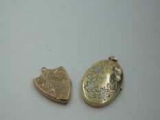 A 9ct white and yellow gold oval locket having engraved floral decoration, and a shield shaped