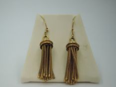 A pair of yellow metal tassel earrings with loop fittings, approx 6.5g