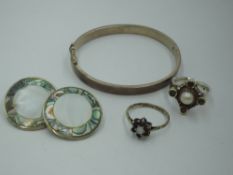 A small selection of silver and white metal jewellery including silver hinged bangle, Artisan