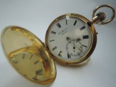 An 18ct gold hunter top wound pocket watch by JW Benson no:833831, having a Roman numeral dial and