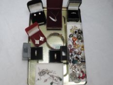 A selection of white metal and HM silver jewellery including three band rings, filligree bangle,