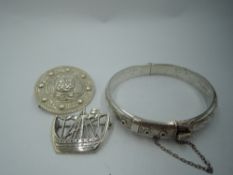 Three pieces of HM silver jewellery including a Celtic brooch, Glasgow 1954, Robert Allison, a