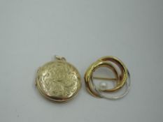 A 9ct white and yellow gold swirl brooch with cultured pearl decoration and a circular 9ct gold