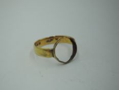 An 18ct gold converted wedding band loop, missing stone, approx 3.8g