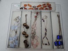 Seven necklaces of various forms including Tiger Eye, rose quartz, blue lace agate etc, and two pair
